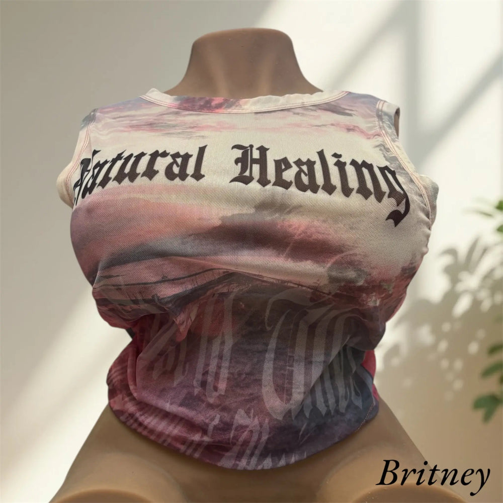 Britney wearing natural healing top
