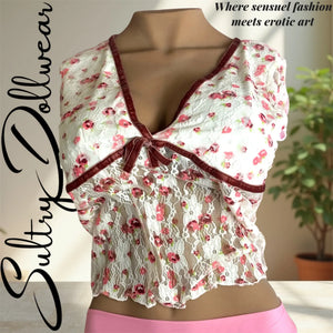 Top de encaje floral–Terciopelo y seducción